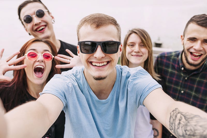 Free Photos - A Group Of Five Friends Smiling And Standing Together For A  Photo. They Are Likely Enjoying A Social Gathering Or Event, And Are  Capturing The Moment With A Picture.